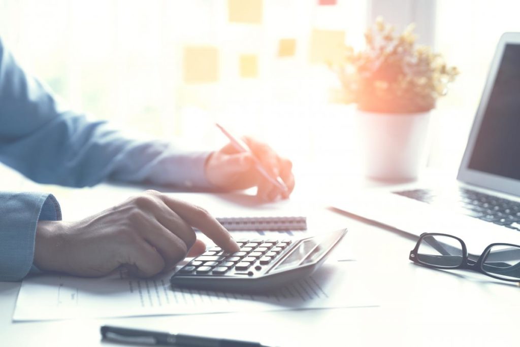 FAMILY OFFICES URGED TO REVIEW INHERITANCE TAX AFFAIRS DURING CORONAVIRUS CRISIS, iStock 1155244022 Accountant counts tax works in the office stock 1