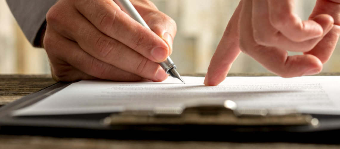 800x600_businessman-showing-where-to-sign-agreement-law-contract-pen_44162119